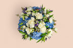 Beautiful country blues floral arrangement by Shaws of Covent Garden - view 3