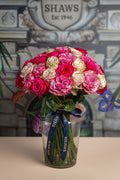 Merry Go Round Rose Dome or Flamed Coloured Dome floral arrangement by Shaws of Covent Garden